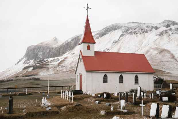 dyrholaey church and graveyard in iceland